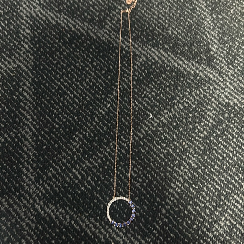 Rose gold with man made sapphires and rhinestones by Bomb Party